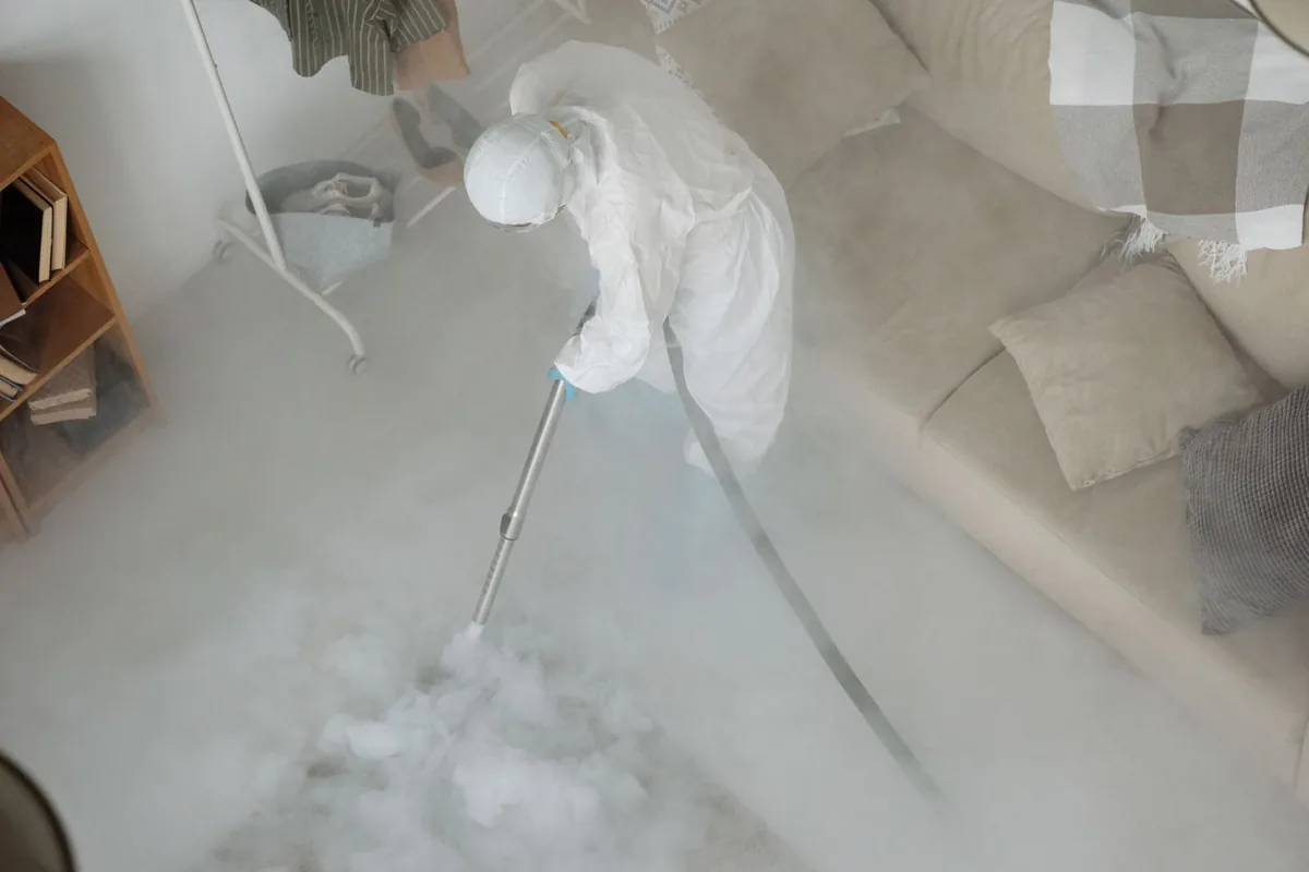 Biohazard cleanup technician in protective equipment, Troy Hills, NJ